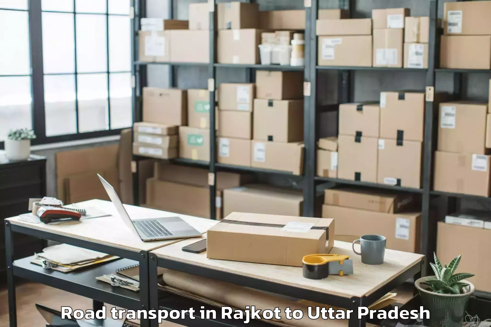 Reliable Rajkot to Manjhanpur Road Transport